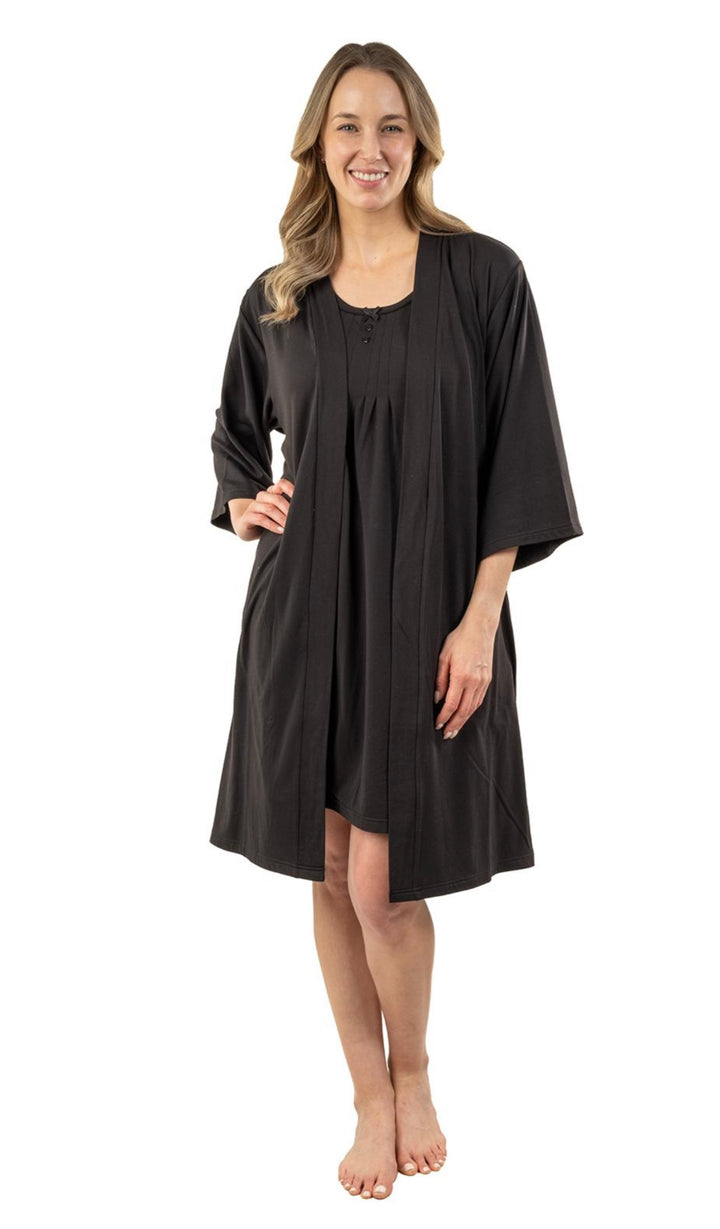 Woman wearing a black robe on a white background