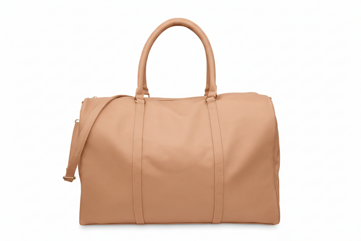 A tan leather duffel bag with double top handles, a detachable shoulder strap