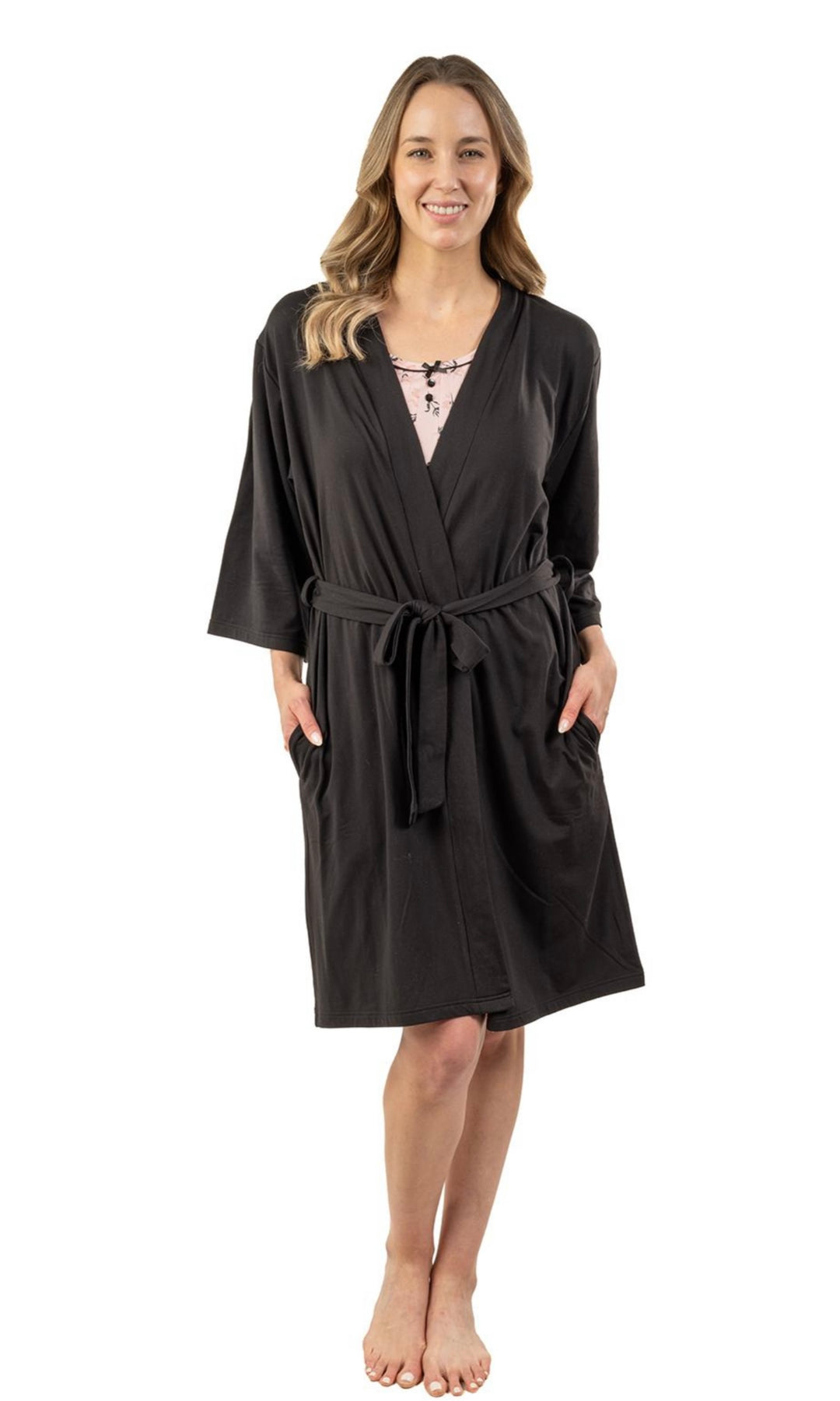 Woman wearing a black robe on a white background