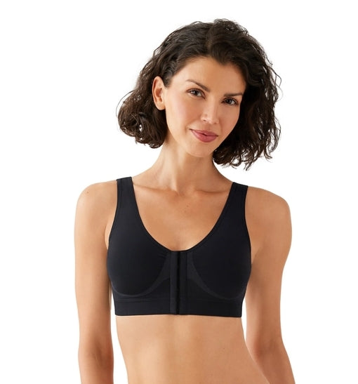 Woman wearing a black bra on a white background