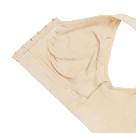 Beige bra on a white background