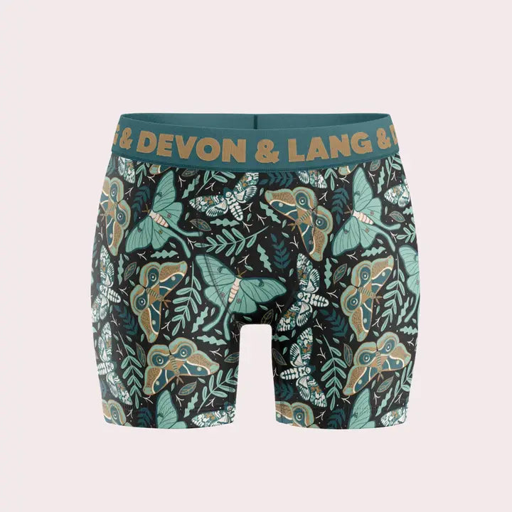 Boxer briefs with butterfly pattern and 'Devon & Lang' branding on a light gray background