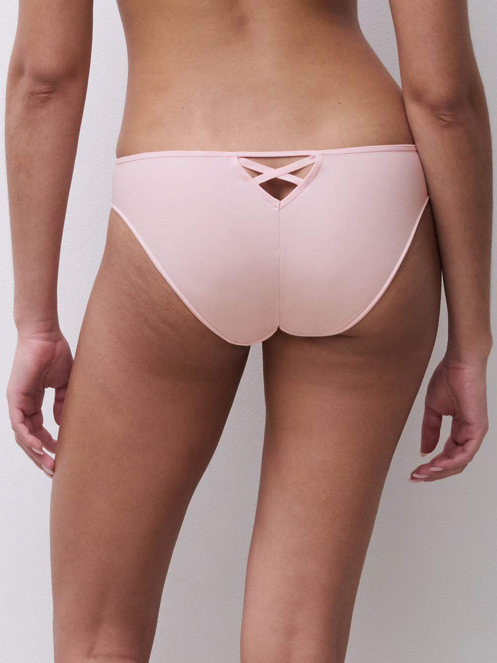 Light pink bikini bottom on a neutral background