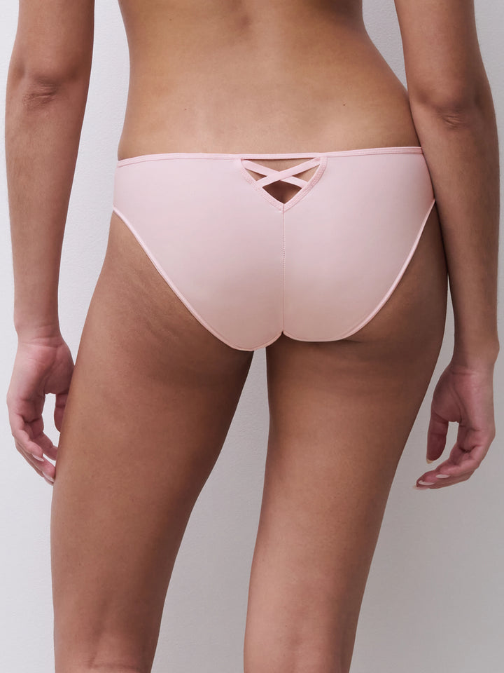 Light pink bikini bottom on a neutral background
