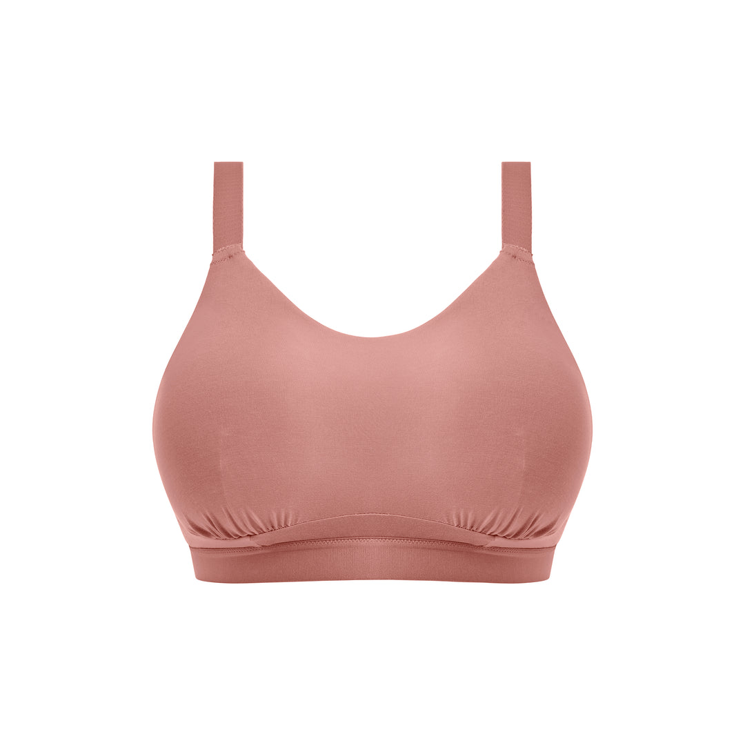 Pink bralette on a white background