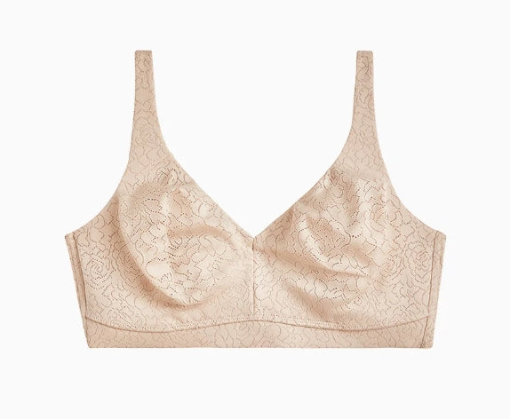 A beige lace underwire bra with wide shoulder straps, shown flat against a plain white background.