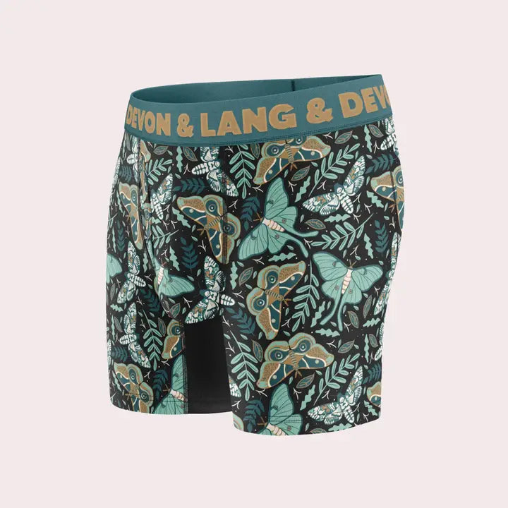 Men's boxer briefs with butterfly pattern and Devon & Lang branding on a light gray background