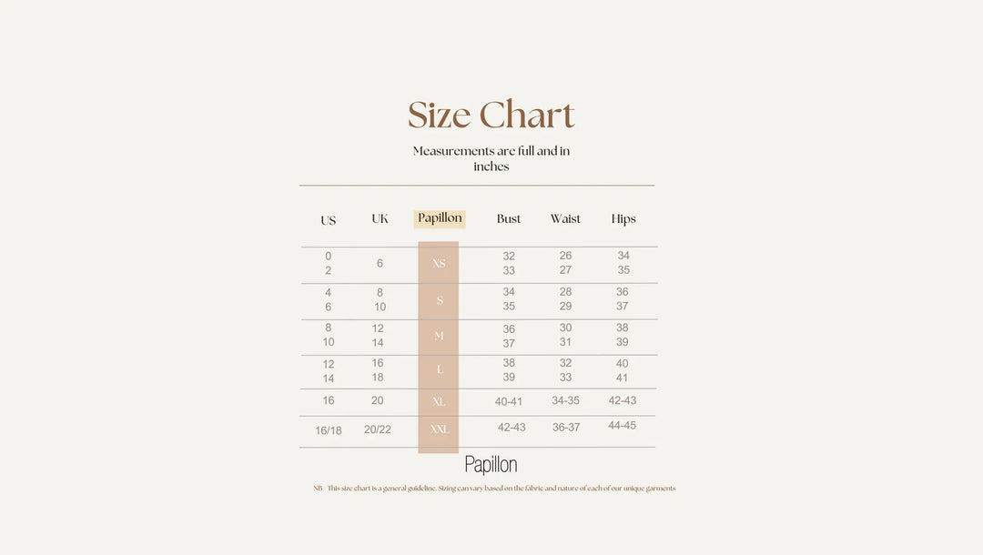 Size chart for Papillon products with measurements in inches, centimeters, and grams.