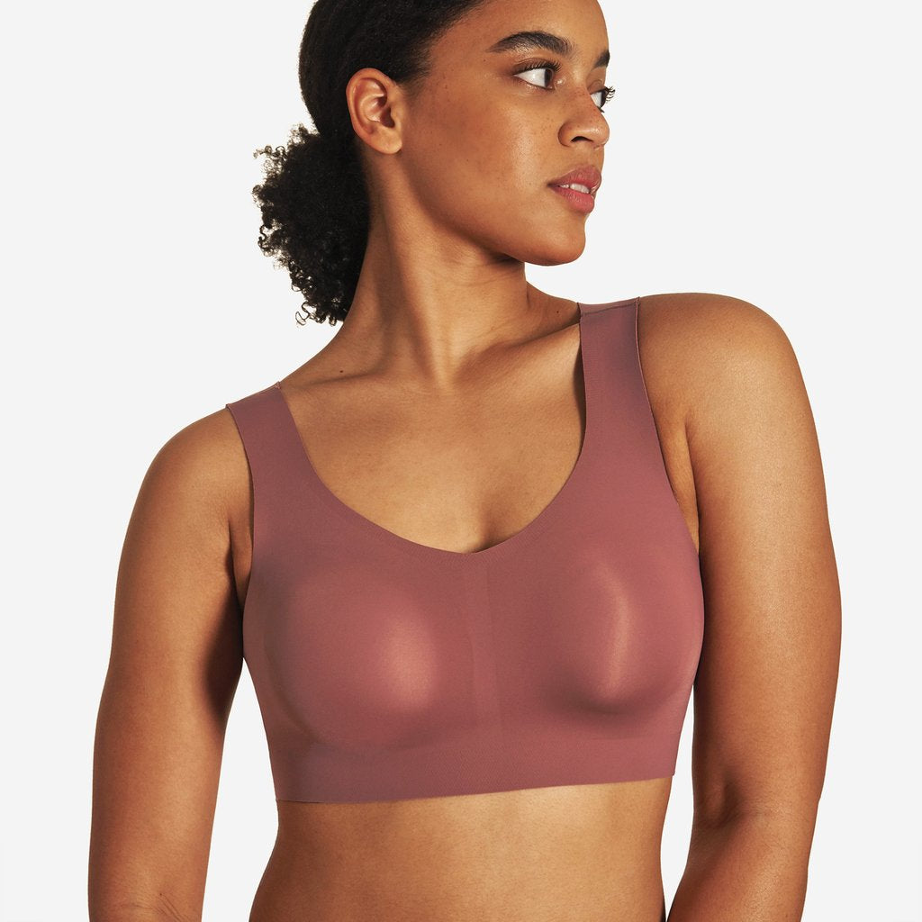 Essentials by Tummy Tank Women's Seamless Comfort Wirefree Bralette with  Removable Pads, Black, Small / Medium : : Clothing, Shoes &  Accessories